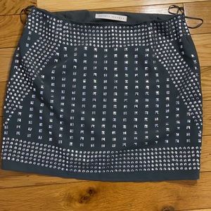 Gray, not black for a change! Super lightweight skirt with silver applications.